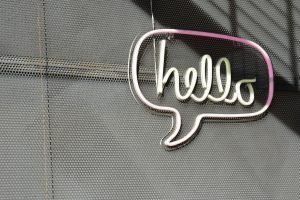 This is a picture of a neon sign that says "hello" used as a decoration